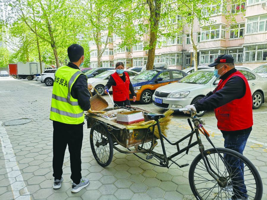 社区 党员身穿“红马甲”志愿服务进社区